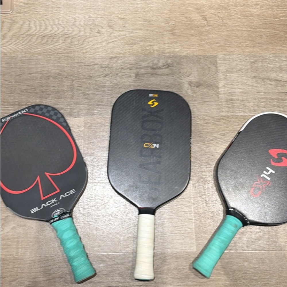 Black Pickleball Paddle with Green Grip